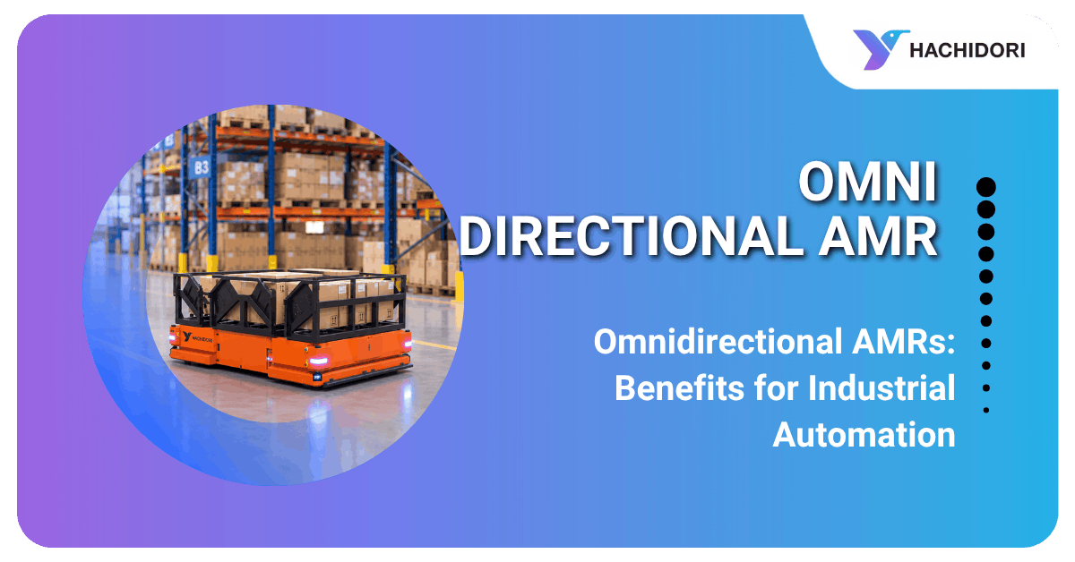 Omnidirectional material handling robot transporting a heavy industrial load through a factory aisle